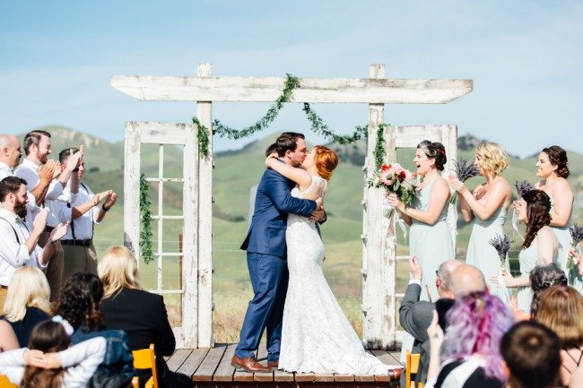 bride and groom kiss